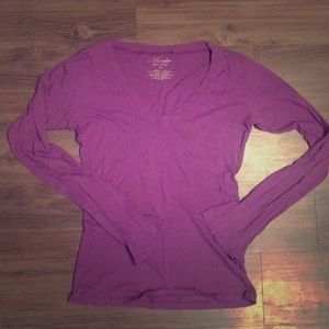 Long-sleeved bright grape colored tshirt, size M.